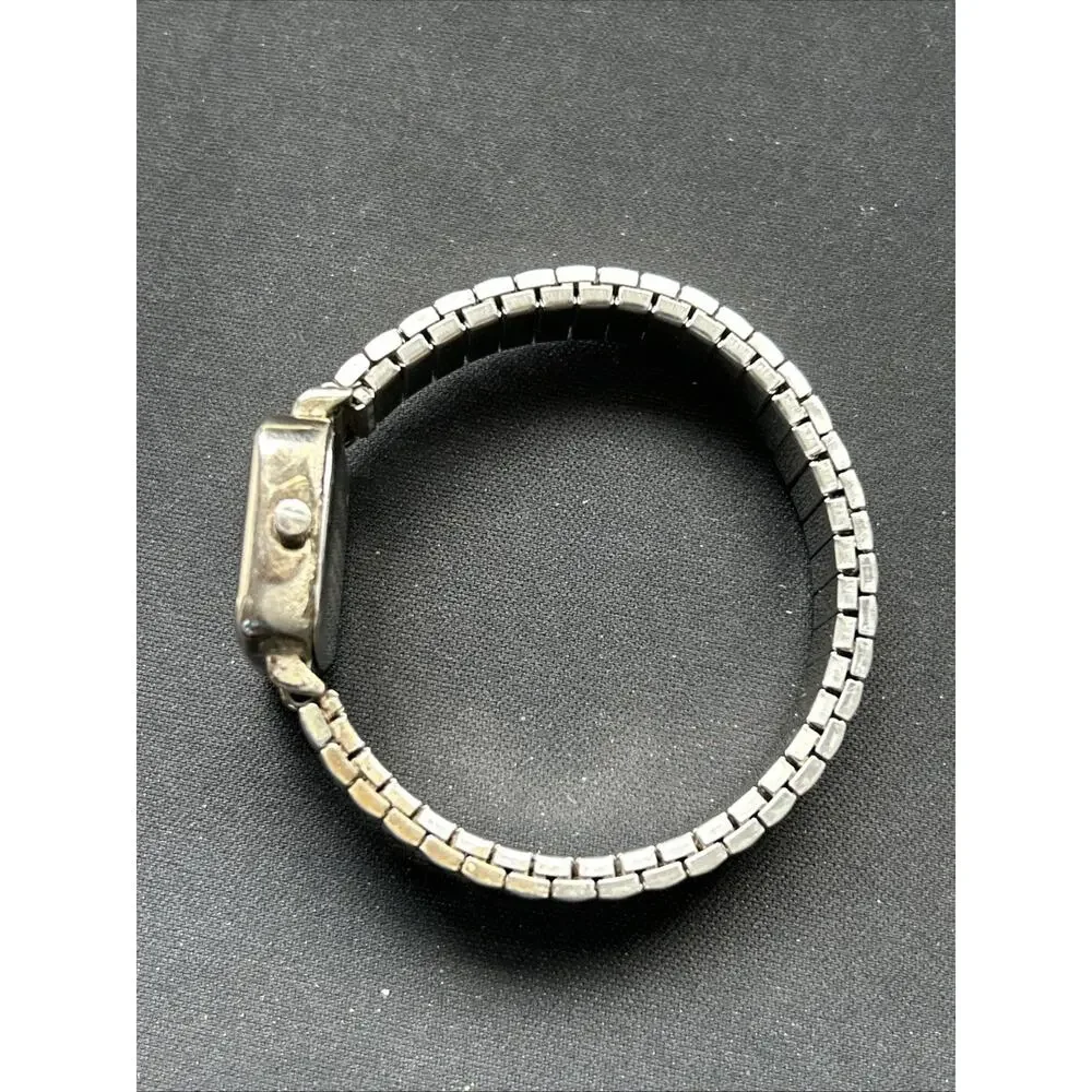 Carriage Navy Blue Dial Silver Tone Women’s Stretch Band Quartz Watch